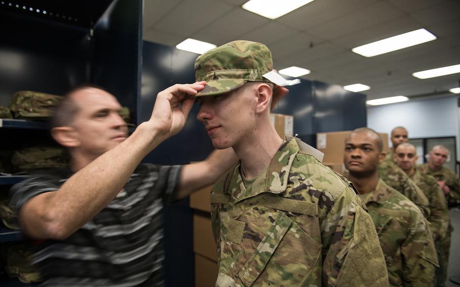 Air Force trainees receive their operational camouflage pattern uniforms, also known as OCPs, at Joint Base San Antonio-Lackland, Texas, Oct. 2, 2019.