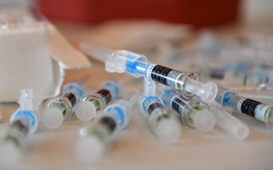Flu shot vaccinations sit on a table at Aviano Air Base, Italy, Oct. 17, 2019. Europe health providers say that pregnant women should get the flu and whooping cough shots to protect infants.