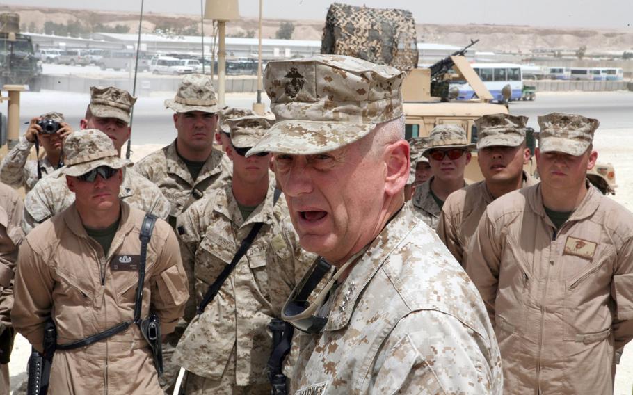 Then-Lt. Gen. Jim Mattis speaks to Marines in Al Asad, Iraq in 2007. A Marine private first class once ''hacked''  the general's computer to send an email from the account to a woman the young enlisted man had a crush on, Mattis told a crowd at a regional Chamber of Commerce luncheon.