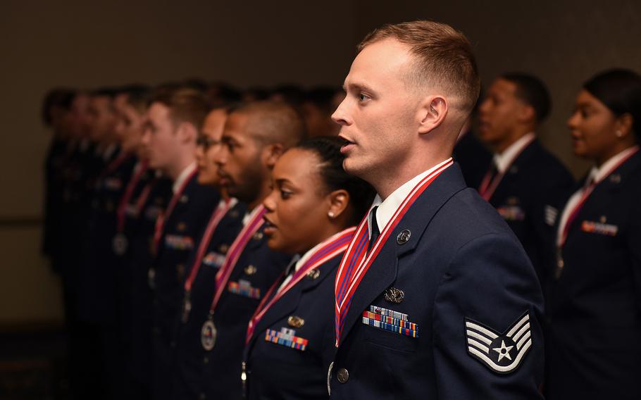 Staff Sgt. Justin Wilson, Airman Leadership School graduate of Class 18-B, recites the Airman's Creed with his fellow class graduates at Vandenberg Air Force Base, Calif., Feb. 8, 2018.