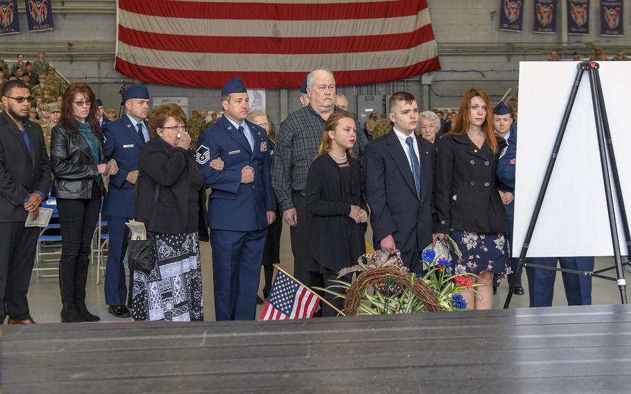 Family members and friends pay their respects during a remembrance ceremony for U.S. Air Force Senior Master Sgt. Rick DeMorgan Jr., a flight engineer with the 4th Special Operations Squadron, at Hurlburt Field, Florida, Jan. 31, 2020.  DeMorgan was one of three Americans killed Jan. 23, 2020, fighting wildfires in Australia.