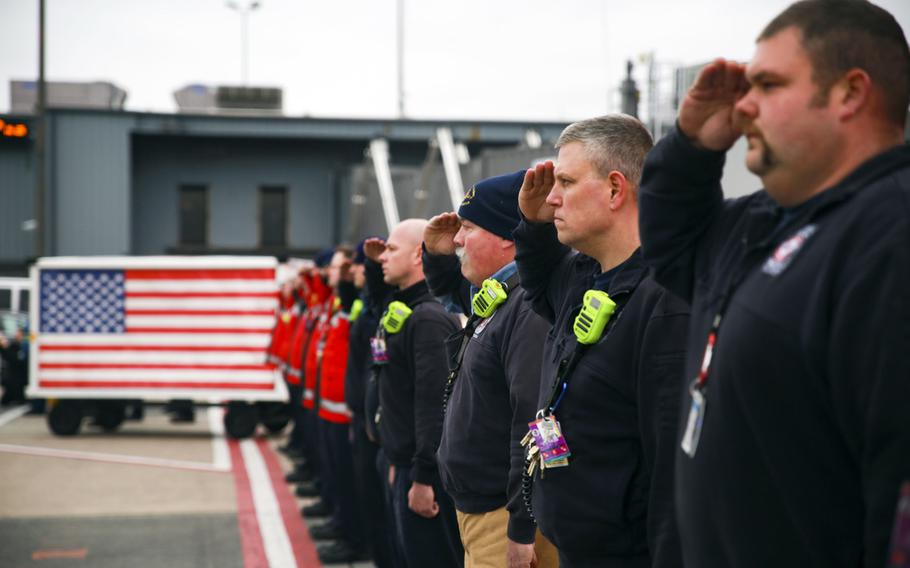 The Metropolitan Washington Fire Rescue Team honors the remains of Lt. Col. Paul C. Hudson at his repatriation ceremony, Dulles International Airport, Sterling Va., Feb. 5, 2020. Hudson was one of the three Americans killed when their C-130 Hercules Aerial Water Tanker crashed while battling wildfires in Australia.