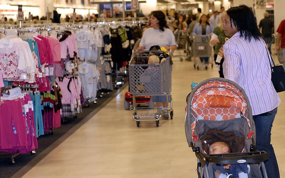 People shop at the Kaiserslautern Military Community Center's base exchange at Ramstein Air Base, Germany. The Army and Air Force Exchange Service is extending its return policy for shoppers through July 1, 2020.