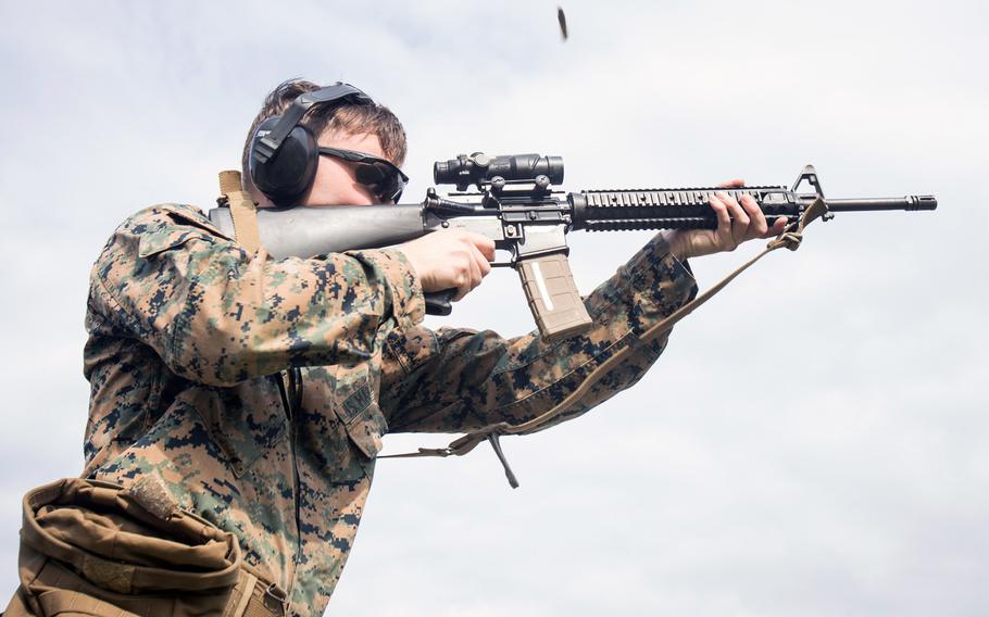 A Marine fires an M16A4 rifle during training at Marine Corps Air Station Cherry Point, North Carolina, March 13, 2020. Colt and FN America will compete for a $383 million contract to supply M16A4 rifles to Afghanistan, Grenada, Iraq, Lebanon and Nepal, the Pentagon announced.