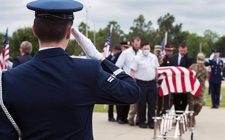 A member of the 138th Fighter Wing Honor Guard salutes during a memorial service for Tech. Sgt. Marshal Roberts, in Claremore, Okla., on May 16, 2020. Roberts was killed when his base in Iraq was struck by multiple rockets on March 11, 2020.