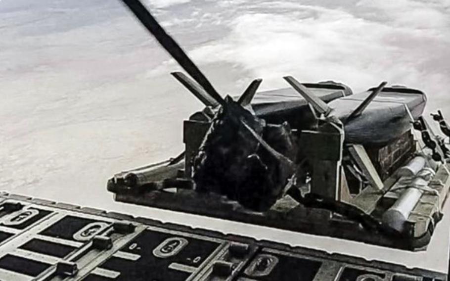 A Cargo Launch Expendable Air Vehicle with Extended Range pallet, also known as CLEAVER, is launched from an MC-130J aircraft in this undated photo provided by the Air Force.