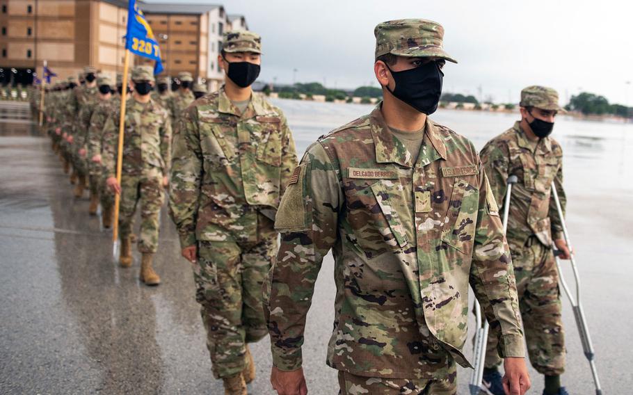 Ten airmen prepare to graduate basic military training June 18, 2020, at Joint Base San Antonio-Lackland, Texas. The airmen took part in the Air Force's Echo Flight English-language immersion program at the Defense Language Institute English Language Center.