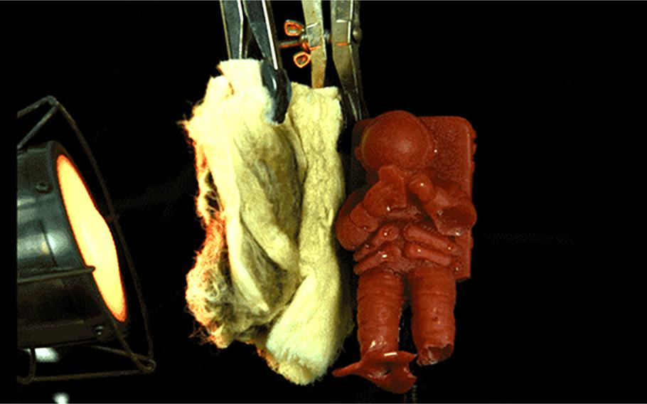 Cadets at the U.S. Military Academy at West Point tested a new nanofiber body armor material by observing whether it would protect a small gelatin astronaut figure from the heat of a blowtorch heater. The lightweight nanofiber sheets were able to withstand 20 times more heat than traditional body armor material, keeping the gelatin astronaut from melting.