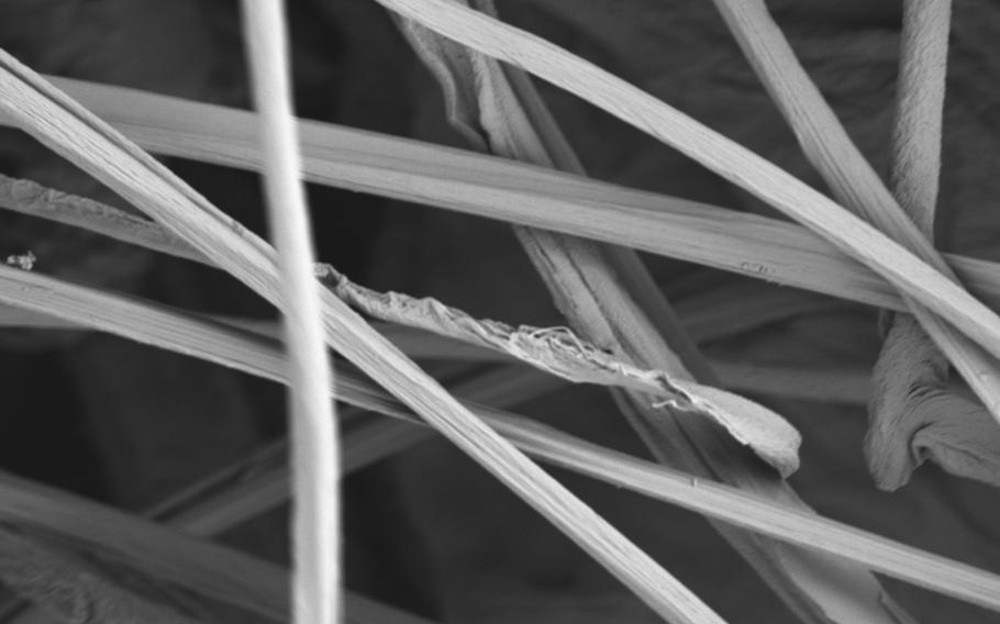 A close-up view of a lightweight nanofiber material developed by researchers at Harvard University in collaboration with the U.S. Army. The empty space between the nanofibers protects against intense heat while still allowing the material to stop shrapnel, researchers said.