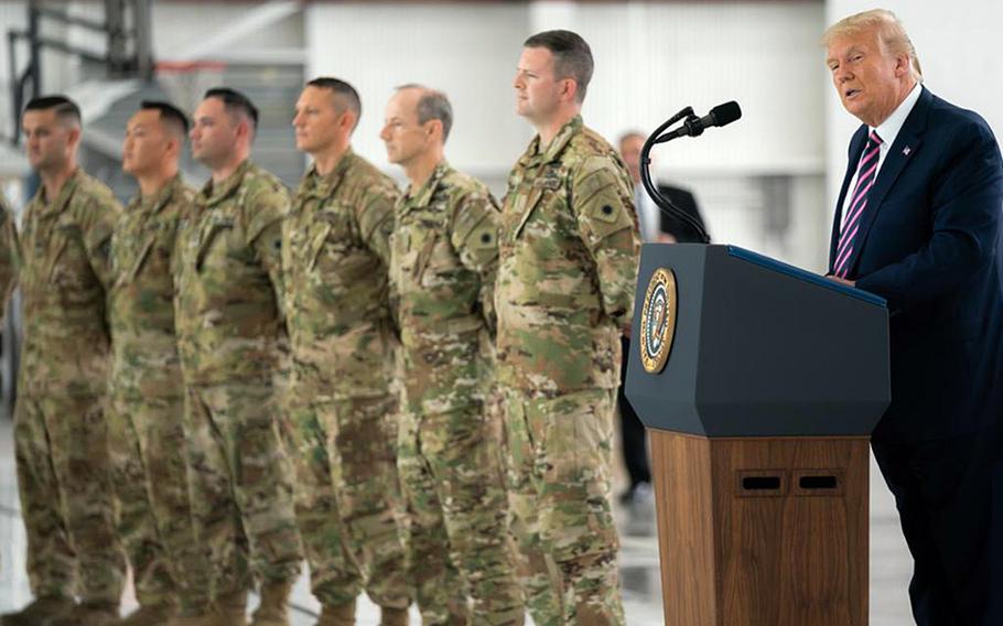 President Donald Trump honored seven members of the California National Guard with the Distinguished Flying Cross at a hangar in McClellan Park, Calif., on Sept. 14, 2020.