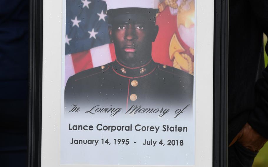 A photo of Lance Cpl. Corey Staten is displayed during an award ceremony held by 4th Combat Engineering Battalion in Baltimore, Md., Oct. 24, 2020. Lance Cpl. Staten was posthumously awarded the Navy Marine Corps Medal for sacrificing his life to save a fellow Marine's life.