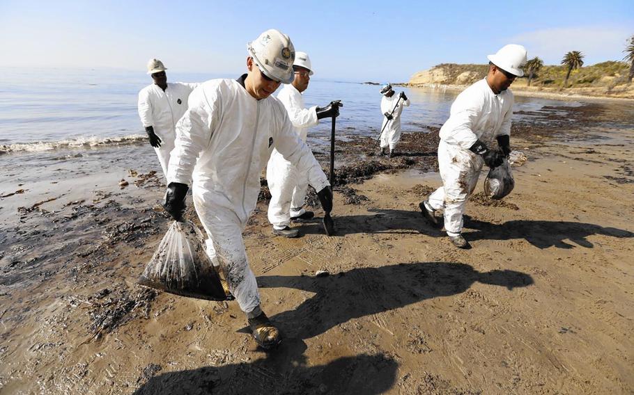Cleanup efforts after the oil spill at Refugio State Beach in 2015. 