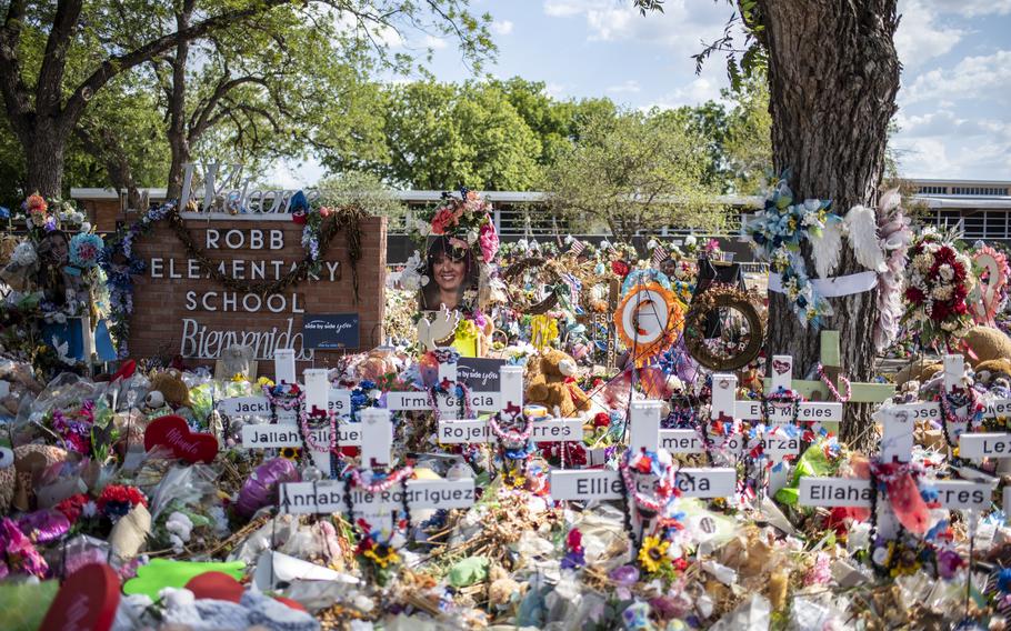 Memorials outside Robb Elementary School in Uvalde, Tex., a week after the deadly 2022 shooting. 