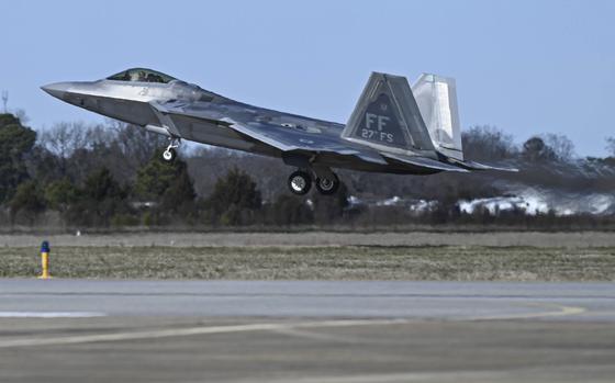 This photo provided by the U.S. Air Force shows a U.S. Air Force pilot taking off in an F-22 Raptor at Joint Base Langley-Eustis, Va., Saturday, Feb. 4, 2023. At the direction President Joe Biden, military aircraft brought down a high altitude surveillance balloon off the coast of South Carolina. 