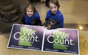 In this April 1, 2019, photo, Noelle Fries, 6, left, and Galen Biel, 6, both of Minneapolis, attend a rally at the Minnesota Capitol to kick off a year-long drive to try to ensure that all Minnesota residents are counted in the 2020 census. Around 1 in 20 residents in Arkansas and Tennessee were missed during the 2020 census. Other U.S. states, including Minnesota, had significant overcounts of their populations, according to figures the U.S. Census Bureau released Thursday, May 19, 2022. 