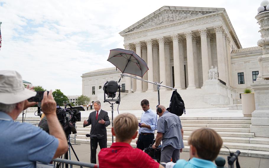 A news crew outside the Supreme Court in Washington, D.C., on June 27, 2023. 
