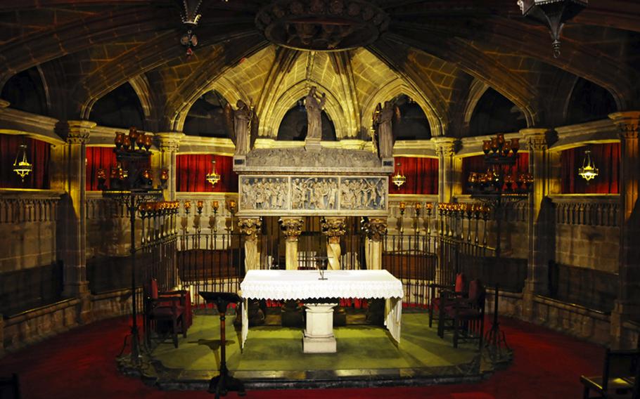Crypt of Saint Eulalia in Cathedral of Barcelona’s cathedral. Saint Eulalia, a 13-year-old  martyred for her refusal to renounce her Christianity, is the co-patron saint of the Catalan city. Her remains are said to be interned in the alabaster sarcophagus. 
