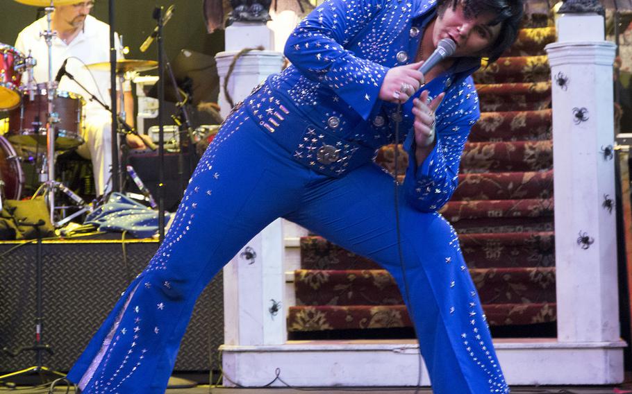 An Elvis impersonator performs at the Fremont Street Experience in downtown Las Vegas
