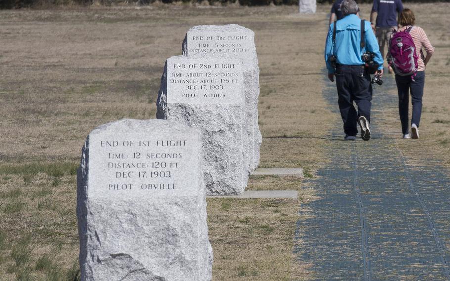 Stones mark the endpoints of the Wright Brothers' first four flights at the Wright Brothers National Memorial in Kitty Hawk, N.C. The progress made between flights 3 and 4 can be seen by the distance of the fourth stone.