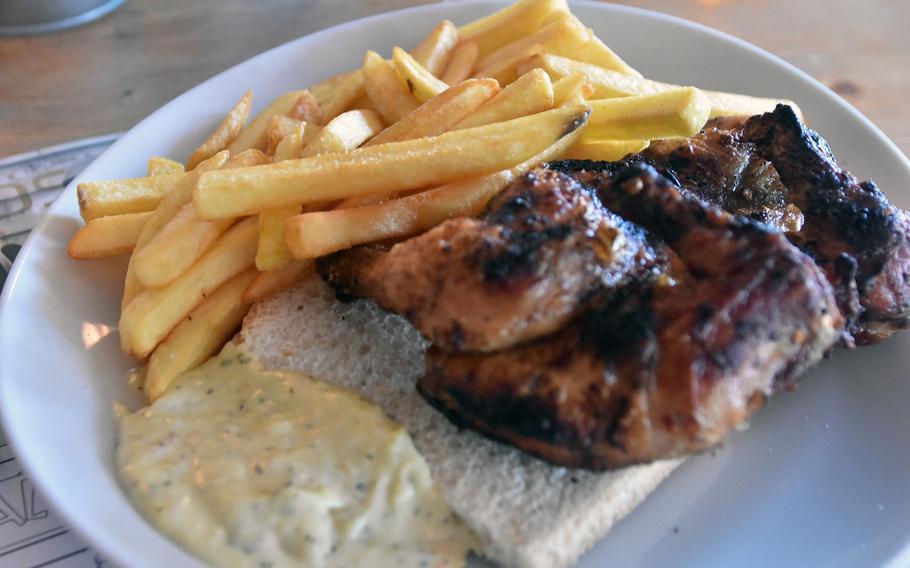 The signature dish at Funky Go, a restaurant along the SS-13 outside Sacile, is barbecued chicken. It's offered with French fries or fried vegetables, a slice of toast and sauce.

