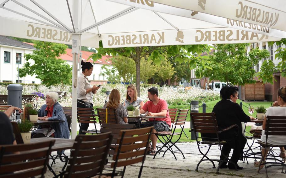 Customers enjoy dining outdoors on a recent August day at the  Brauhaus an der Gartenschau in Kaiserslautern, Germany, a German-style restaurant located near the city's Gartenschau.
