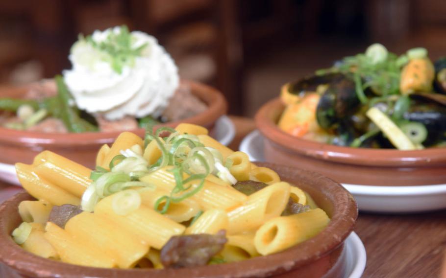 Penne pasta is among the dishes served at Tapasitos. The hip and vibrant restaurant caters to a young clientele.