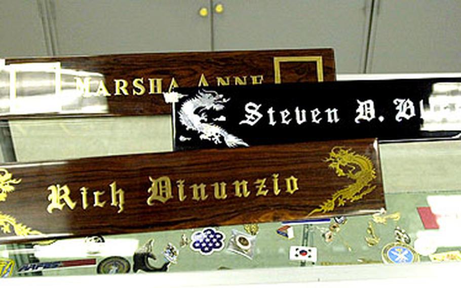 Desk nameplates range in price from $25 to $40, with a variety of designs and finishes.