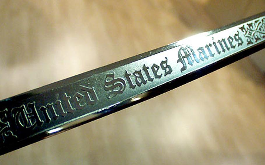 A close look at a ceremonial U.S. Marine Corps sword from Swords from Toledo.