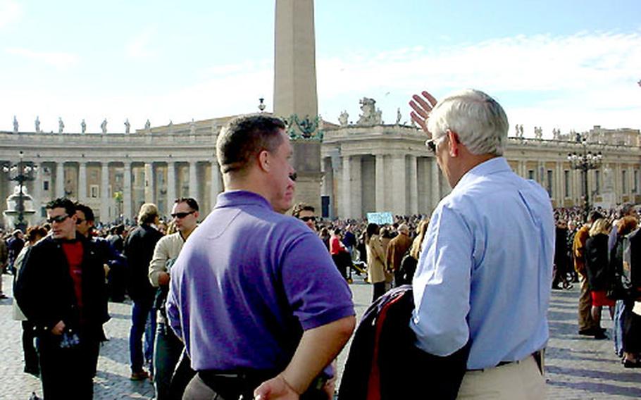 Stars and Stripes Publisher Tom Kelsch, right, shares observations with Lt. Col. Norman Schaefer, commander of European Stars and Stripes, in Rome’s St. Peter’s Square.