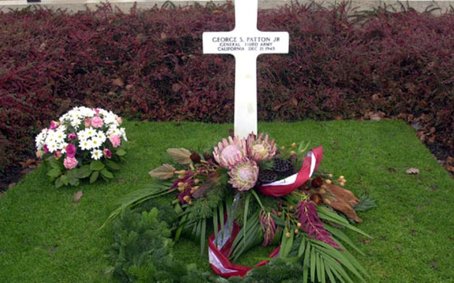 The grave of Gen. George S. Patton at the Luxembourg American Cemetery and Memorial in Luxembourg.