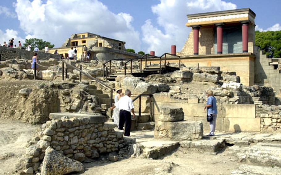 Tourists walk through the ancient ruins of the Minoan palace at Knossos. The Knossos ruins offer glimpses of Europe’s fierce genesis.