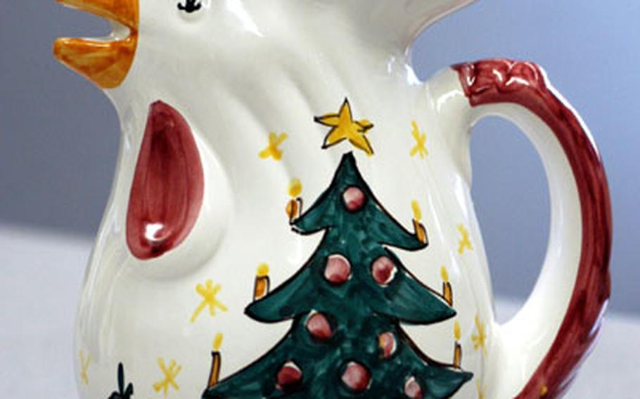 The colors and designs of chicken pitchers vary. This Christmas pitcher, for instance, provides a change from the ubiquitous flower designs. Add some holly or greenery and you’ve got a holiday centerpiece.