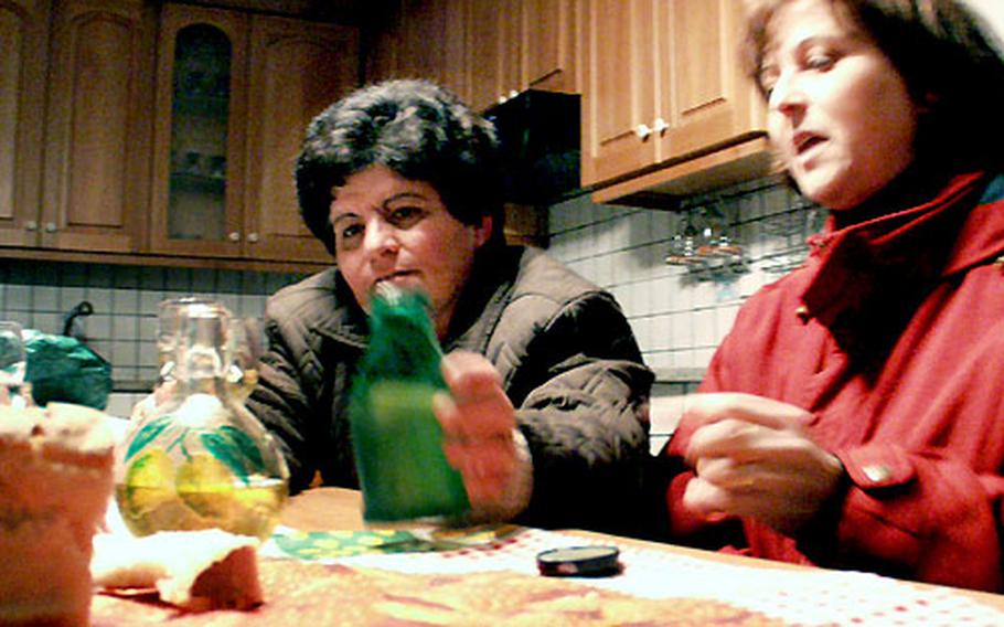 Letizia Coppola, left, and Rachele Aconi, friends living near Naples, regularly make their own limoncello using recipes passed down from generation to generation.