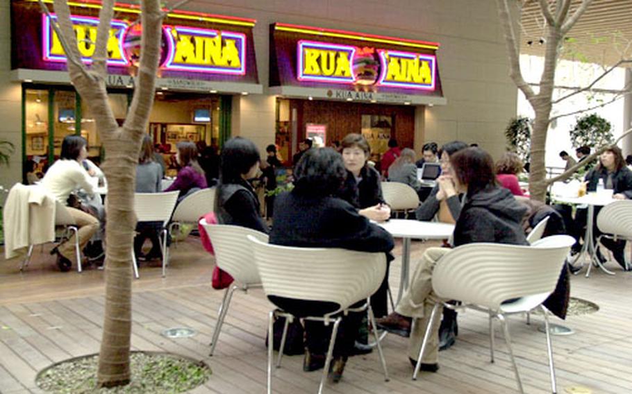 A view of the dining area in front of Kua’aina, a Hawaiian burger restaurant found on the sixth floor in the building.