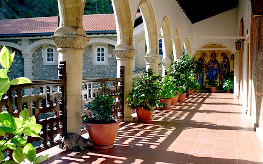 A peaceful walkway inside Kykkos Monastery in the Troodos Mountains.