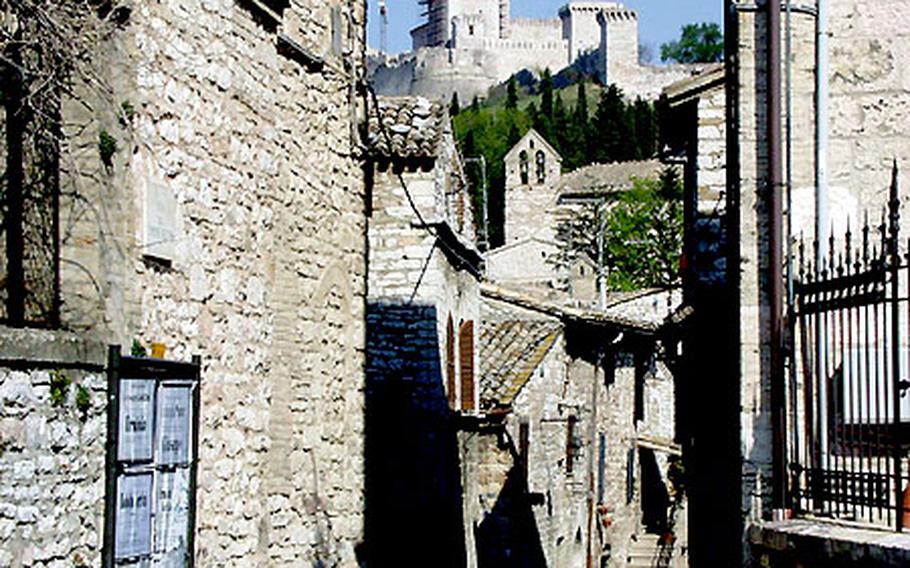 The Rocca Maggiore, currently undergoing reconstruction, towers over the city of Assisi. But more tourists navigate the winding streets of the Umbrian city than climb the hill to visit the medieval fortress.