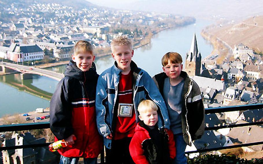 In planning family trips, the Moise family of Berglangenbach, Germany, makes sure there is something for everyone to enjoy. Posing for a photo overlooking Bernkastel-Kues on the Moselle River are the Moise sons, from left, Kyler, 9, Garrett, 11, Rohan, 4, and Bailey, 7.