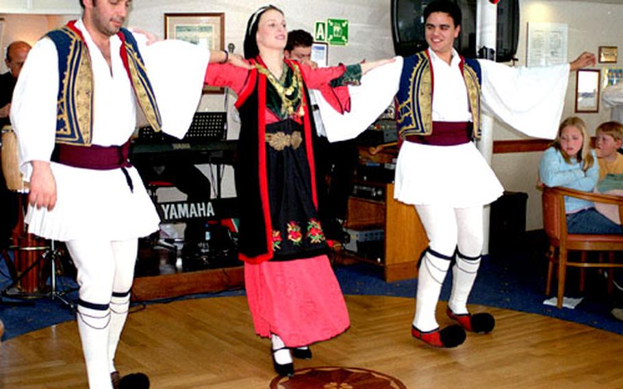 Traditional Greek dancing enlivens some day cruises to Aegina, Poros and Hydra.