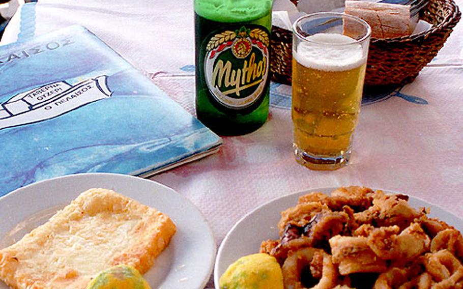A wonderful Greek meal consists of fried calamari, fried feta cheese, and a smooth Greek beer like Mythos.