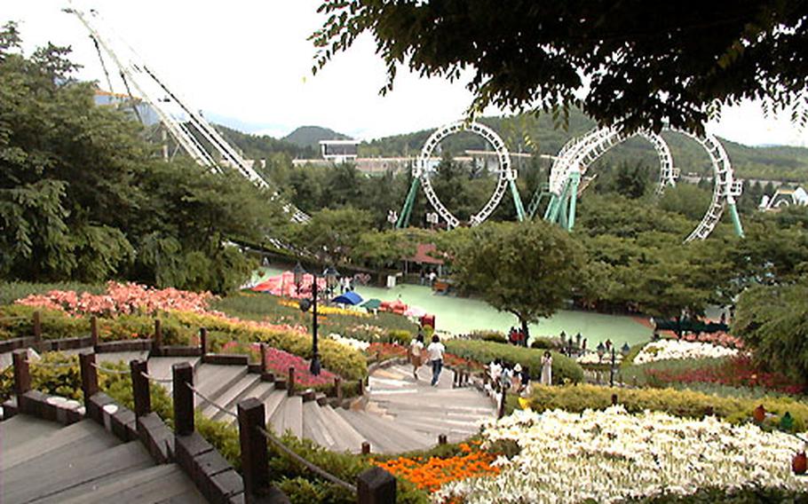 At Woobang Tower Land in Taegu, South Korea, flowers and greenery are as much a part of the place as the roller coasters and other rides and attractions.