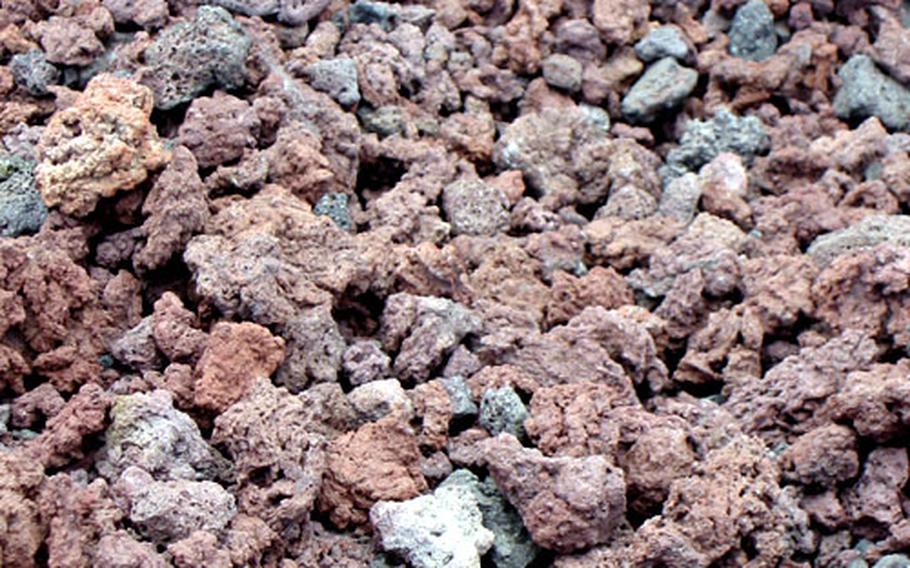 Lava rocks form most of the hiking trial on Mount Fuji.