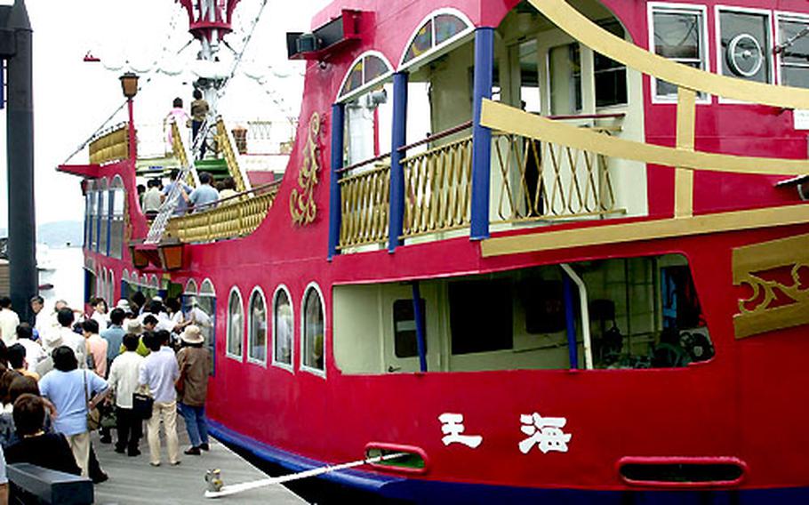 The crowd gathers to step onboard “The Pirate Ship,” or the Kaioh Pleasure Boat, as it sailed from the Kashimae Pier at the Saikai Pearl Sea Center and headed into the Saikai National Park 99 Islands.