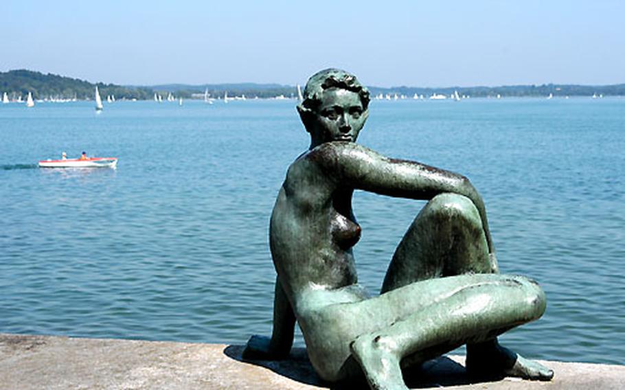 AFRC Chiemsee&#39;s famous bather statue on the terrace of the Lake Hotel. According to legend it is Eva Braun, Hitler&#39;s mistress and in the end, his wife.