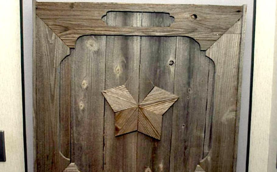 The museum holds a piece of the Sawaguchi’s barn bearing a symbol that somewhat resembles a Star of David — which would normally have six points.