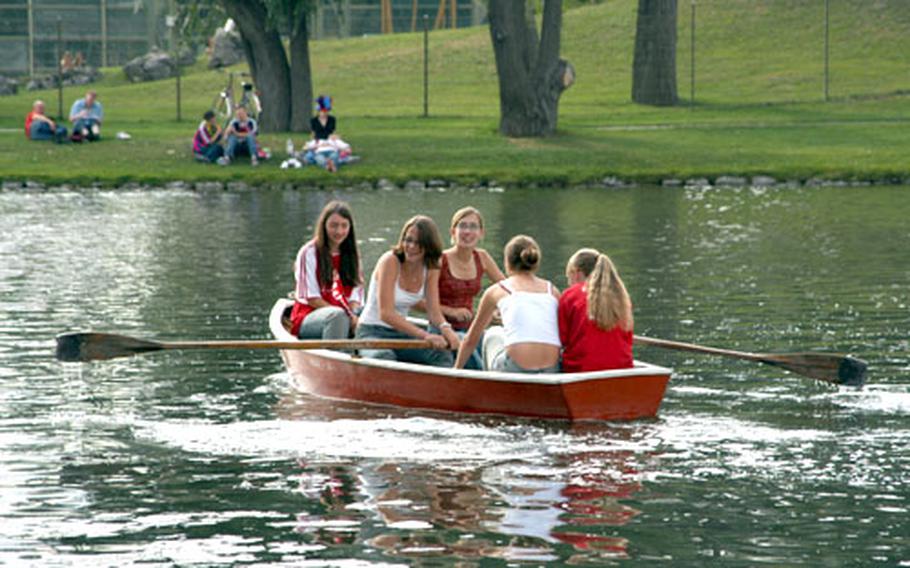 Rowing on the lake in the Olympiapark in Munich.