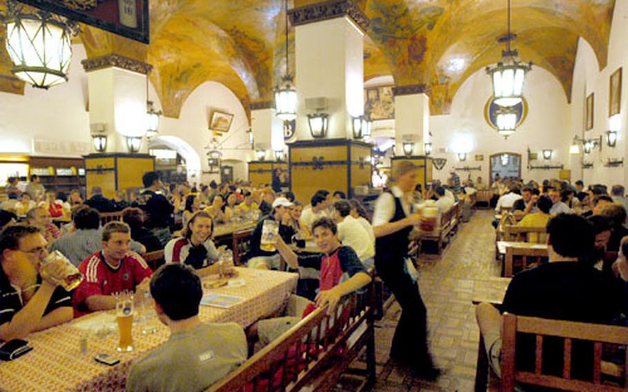 Inside the Hofbrauhaus, Munich&#39;s famed, popular beer hall.