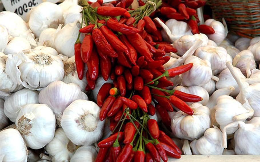 Garlic and peppers on sale at a stand at the Viktualienmarkt.