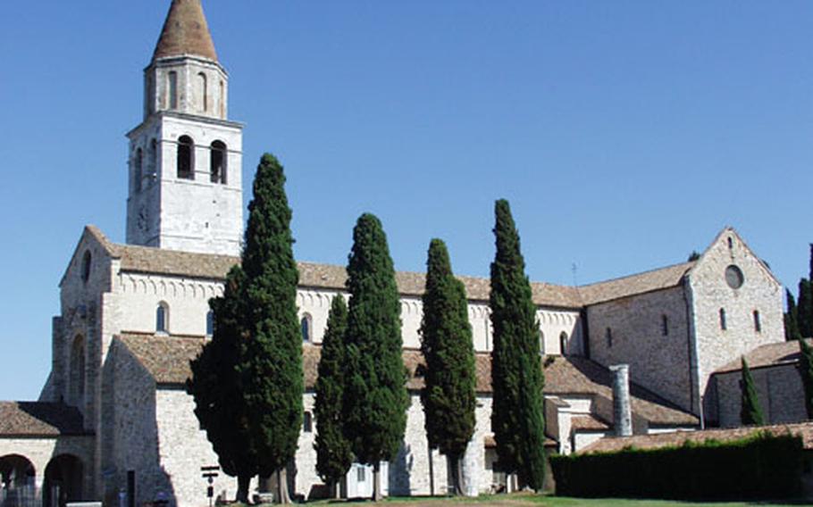 The Patriarchal Basilica in Aquileia, Italy, houses mosaics that date from the fifth century, when Christianity played an important role in the Roman empire. The church also boasts frescoes from the 12th century.