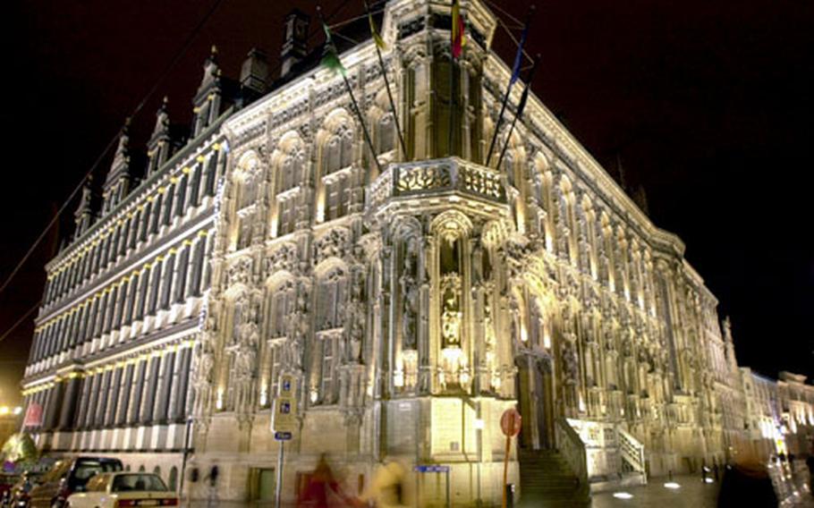 Ornate statues and carvings decorate the facade of the Town Hall in Ghent, Belgium. It was built between the 15 and 17th centuries, and is considered one of the best examples of Gothic architecture.