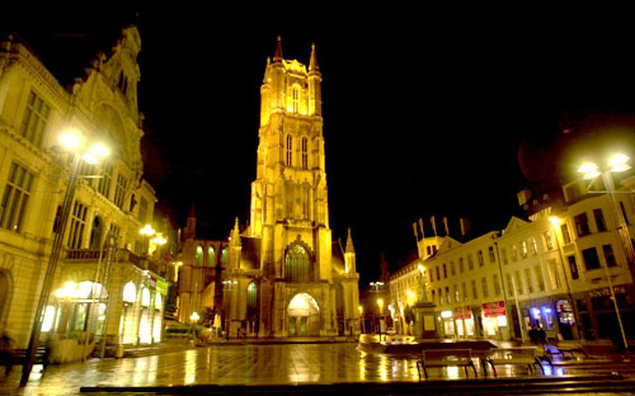 St. Baaf’s Square appears to be gilded during a late night in Ghent.